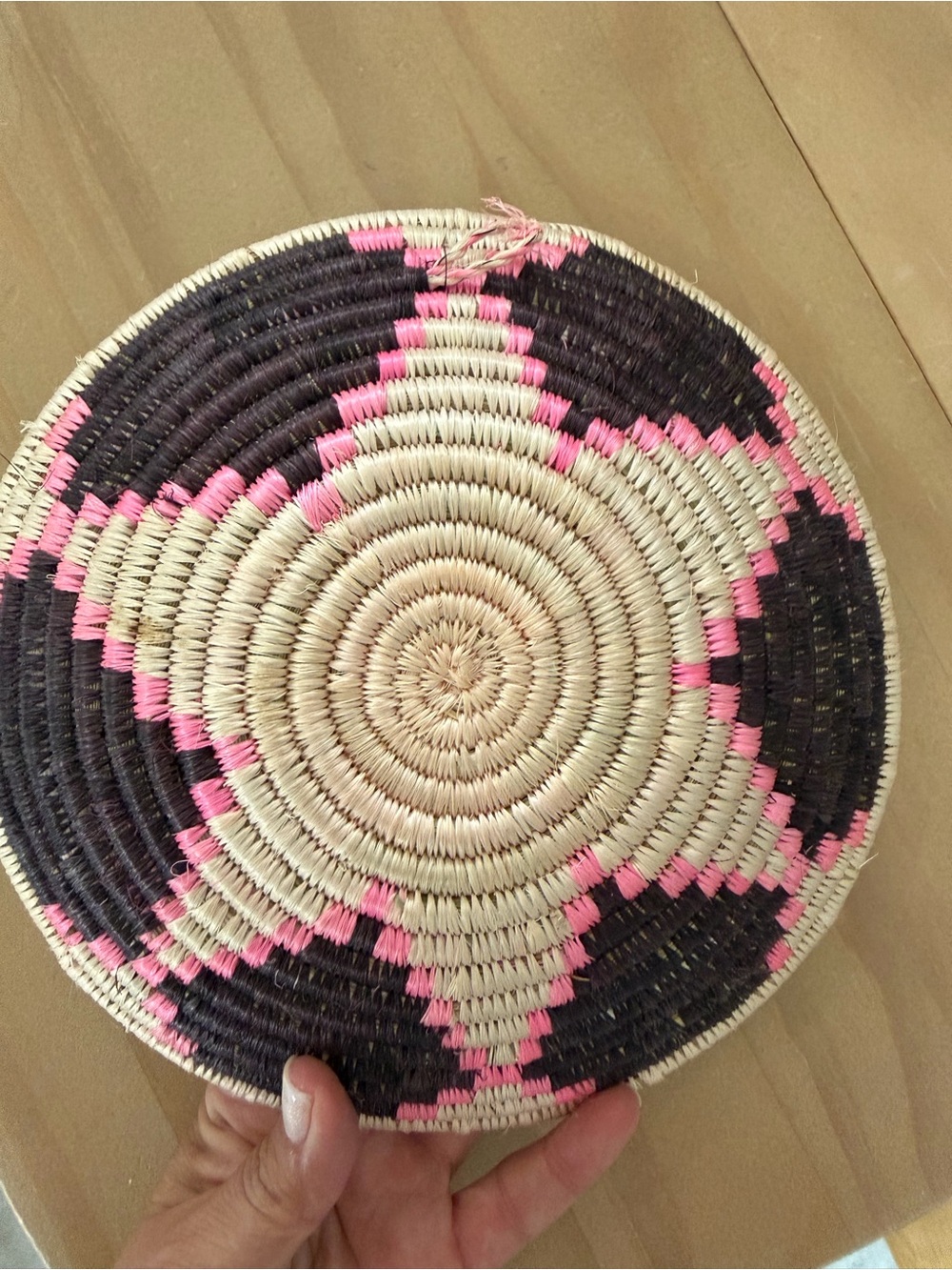 African Handwoven Decorative Basket tray in Black, cream, & bright Pink. - Picture 3 of 5